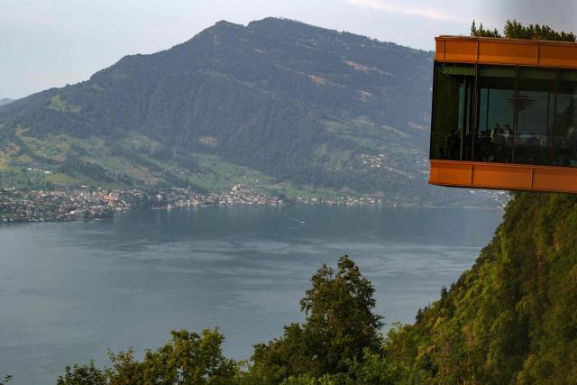 This photograph shows the delegation staff at the Burgenstock luxury hotel complex overlooking Lake Lucerne, Switzerland, on the day of talks between the U.S., Iran, Pakistan, and Qatar at the Lake Lucerne, Switzerland, on June 21, 2026, as part of high-level talks aimed at advancing a deal to end the Middle East conflict. A new round of negotiations over the Middle East war was set to kick off on June 21, 2026 with Iranian negotiators arriving in the Swiss host city hours ahead of US Vice President JD Vance, even as Tehran said it was closing the Strait of Hormuz again over Israeli attacks in Lebanon. (Photo by Nathan Howard / POOL / AFP)