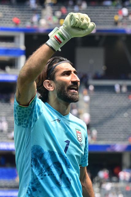 Iran's goalkeeper #01 Alireza Beiranvand celebrates at the end of the 2026 World Cup Group G football match between Belgium and Iran at the Los Angeles Stadium in Inglewood on June 21, 2026.  (Photo by Frederic J. Brown / AFP)