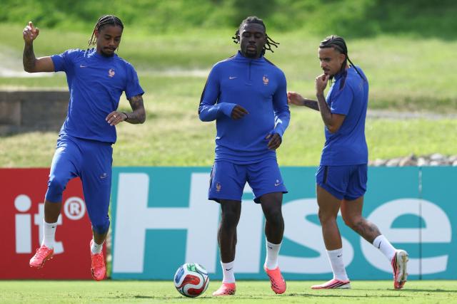 (From L) France's forward #12 Bradley Barcola, midfielder #06 Manu Kone and defender #02 Malo Gusto take part in an MD-1 training session at the University of Pennsylvania in Philadelphia on June 21, 2026, on the eve of the 2026 World Cup Group I football match between France and Iraq. (Photo by Franck FIFE / AFP)