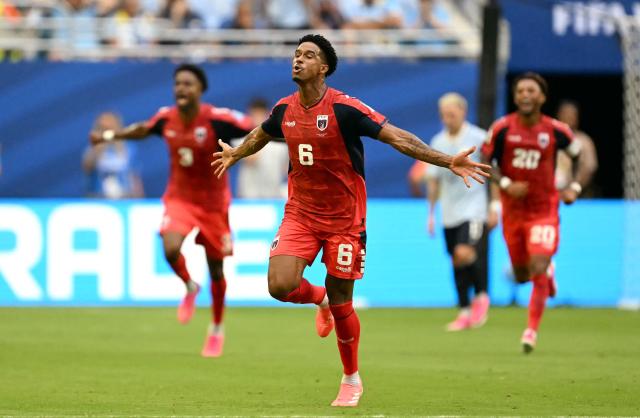Cape Verde's midfielder #06 Kevin Pina celebrates after scoring his team's first goal during the 2026 World Cup Group H football match between Uruguay and Cape Verde at the Miami Stadium in Miami Gardens on June 21, 2026.  (Photo by CHANDAN KHANNA / AFP)
