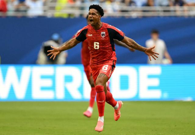 Cape Verde's midfielder #06 Kevin Pina celebrates after scoring his team's first goal during the 2026 World Cup Group H football match between Uruguay and Cape Verde at the Miami Stadium in Miami Gardens on June 21, 2026.  (Photo by CHANDAN KHANNA / AFP)