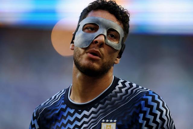 Uruguay's defender #03 Sebastian Caceres gestures as he takes part in the warm-up ahead of the 2026 World Cup Group H football match between Uruguay and Cape Verde at the Miami Stadium in Miami Gardens on June 21, 2026.  (Photo by PATRICIA DE MELO MOREIRA / AFP)