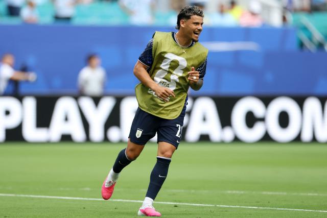 Uruguay's midfielder #20 Maximiliano Araujo smiles as he takes part in the warm-up ahead of the 2026 World Cup Group H football match between Uruguay and Cape Verde at the Miami Stadium in Miami Gardens on June 21, 2026.  (Photo by PATRICIA DE MELO MOREIRA / AFP)