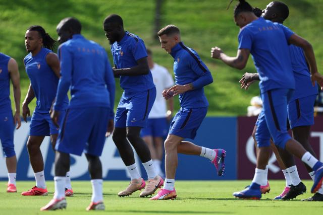 (From L) France's defender #05 Jules Kounde, defender #04 Dayot Upamecano and France's defender #03 Lucas Digne takes part in an MD-1 training session at the University of Pennsylvania in Philadelphia on June 21, 2026, on the eve of the 2026 World Cup Group I football match between France and Iraq. (Photo by Franck FIFE / AFP)