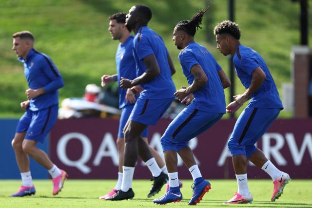 France's forward #11 Michael Olise and forward #20 Desire Doue take part in an MD-1 training session at the University of Pennsylvania in Philadelphia on June 21, 2026, on the eve of the 2026 World Cup Group I football match between France and Iraq. (Photo by Franck FIFE / AFP)