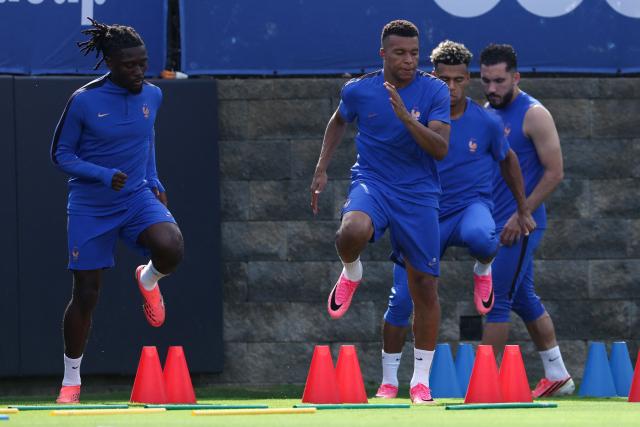 France's midfielder #06 Manu Kone (L) and forward #10 Kylian Mbappe take part in an MD-1 training session at the University of Pennsylvania in Philadelphia on June 21, 2026, on the eve of the 2026 World Cup Group I football match between France and Iraq. (Photo by Franck FIFE / AFP)