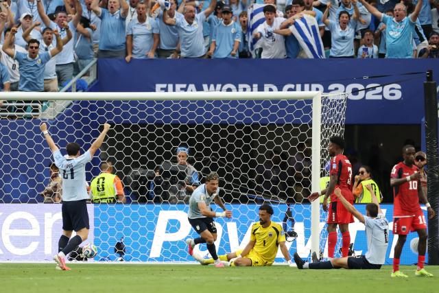 Uruguay's midfielder #20 Maximiliano Araujo celebrates scoring his team's first goal during the 2026 World Cup Group H football match between Uruguay and Cape Verde at the Miami Stadium in Miami Gardens on June 21, 2026.  (Photo by PATRICIA DE MELO MOREIRA / AFP)