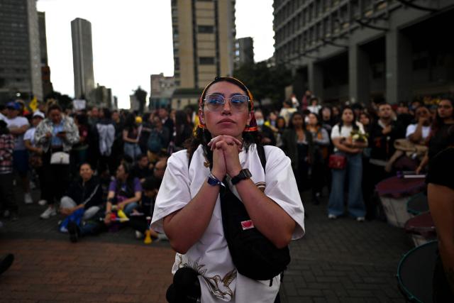 A supporter of Colombias presidential candidate for the ruling Pacto Historico party Ivan Cepeda reacts to the results of the presidential runoff election in Bogota, Colombia, on June 21, 2026. A flamboyant US-backed lawyer who has never held public office narrowly won Colombia's presidential runoff Sunday, swinging the country hard to the right on a promise to wage war against drug-running guerrilla groups. With more than 99 percent of polling centers reporting, Abelardo de la Espriella had 49.67 percent of the vote, an unassailable lead over his rival, left-wing Senator Ivan Cepeda who trailed at 48.69 percent, according to official results. (Photo by Luis ACOSTA / AFP)