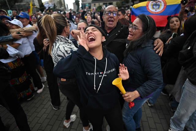 Supporters of Colombia's presidential candidate for the ruling Pacto Historico party Ivan Cepeda react to the results of the presidential runoff election in Bogota, Colombia, on June 21, 2026. A flamboyant US-backed lawyer who has never held public office narrowly won Colombia's presidential runoff Sunday, swinging the country hard to the right on a promise to wage war against drug-running guerrilla groups. With more than 99 percent of polling centers reporting, Abelardo de la Espriella had 49.67 percent of the vote, an unassailable lead over his rival, left-wing Senator Ivan Cepeda who trailed at 48.69 percent, according to official results. (Photo by Luis ACOSTA / AFP)