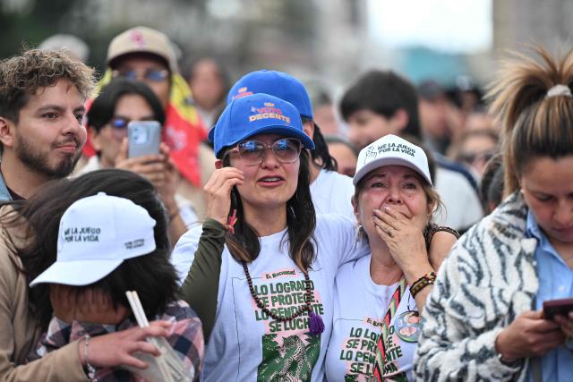 Supporters of Colombia's presidential candidate for the ruling Pacto Historico party Ivan Cepeda react to the results of the presidential runoff election in Bogota, Colombia, on June 21, 2026. A flamboyant US-backed lawyer who has never held public office narrowly won Colombia's presidential runoff Sunday, swinging the country hard to the right on a promise to wage war against drug-running guerrilla groups. With more than 99 percent of polling centers reporting, Abelardo de la Espriella had 49.67 percent of the vote, an unassailable lead over his rival, left-wing Senator Ivan Cepeda who trailed at 48.69 percent, according to official results. (Photo by Luis ACOSTA / AFP)