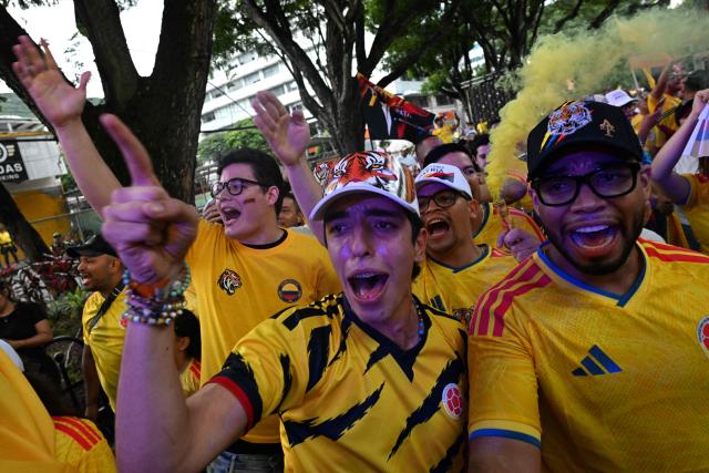 Supporters of Colombia's presidential candidate for the Defensores de la Patria movement Abelardo de la Espriella celebrate the results of the presidential runoff election in Cali, Colombia, on June 21, 2026. A flamboyant US-backed lawyer who has never held public office narrowly won Colombia's presidential runoff on June 21, swinging the country hard to the right on a promise to wage war against drug-running guerrilla groups. With more than 99 percent of polling centers reporting, Abelardo de la Espriella had 49.67 percent of the vote, an unassailable lead over his rival, left-wing Senator Ivan Cepeda who trailed at 48.69 percent, according to official results. (Photo by Joaquin SARMIENTO / AFP)