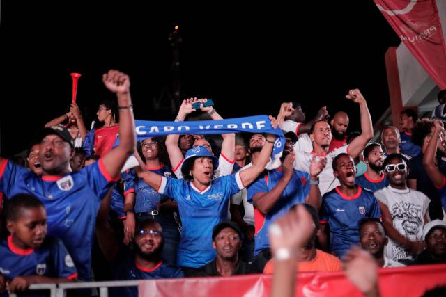 Cape Verde fans react after their team scored against Uruguay during their FIFA World Cup match in Praia on June 22, 2026. (Photo by Jose Correia / AFP)