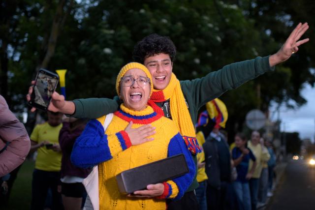 Supporters of Colombia's presidential candidate for the Defensores de la Patria movement Abelardo de la Espriella celebrate the results of the presidential runoff election in Bogota, on June 21, 2026. A flamboyant US-backed lawyer who has never held public office narrowly won Colombia's presidential runoff on June 21, swinging the country hard to the right on a promise to wage war against drug-running guerrilla groups. With more than 99 percent of polling centers reporting, Abelardo de la Espriella had 49.67 percent of the vote, an unassailable lead over his rival, left-wing Senator Ivan Cepeda who trailed at 48.69 percent, according to official results. (Photo by Sebastian BARROS / AFP)