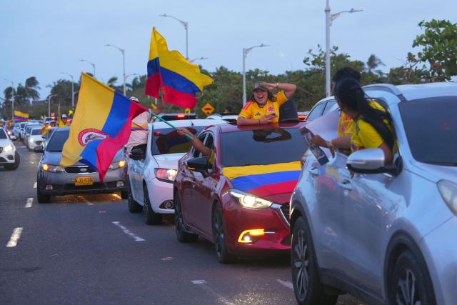 Supporters of Colombia's presidential candidate for the Defensores de la Patria movement, Abelardo de la Espriella, celebrate the results of the presidential runoff election in Barranquilla, Colombia on June 21, 2026. A flamboyant US-backed lawyer who has never held public office narrowly won Colombia's presidential runoff on June 21, swinging the country hard to the right on a promise to wage war against drug-running guerrilla groups. With more than 99 percent of polling centers reporting, Abelardo de la Espriella had 49.67 percent of the vote, an unassailable lead over his rival, left-wing Senator Ivan Cepeda who trailed at 48.69 percent, according to official results. (Photo by Vanexa Romero / AFP)