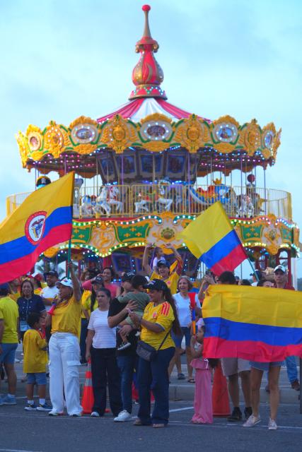 Supporters of Colombia's presidential candidate for the Defensores de la Patria movement, Abelardo de la Espriella, celebrate the results of the presidential runoff election in Barranquilla, Colombia on June 21, 2026. A flamboyant US-backed lawyer who has never held public office narrowly won Colombia's presidential runoff on June 21, swinging the country hard to the right on a promise to wage war against drug-running guerrilla groups. With more than 99 percent of polling centers reporting, Abelardo de la Espriella had 49.67 percent of the vote, an unassailable lead over his rival, left-wing Senator Ivan Cepeda who trailed at 48.69 percent, according to official results. (Photo by Vanexa Romero / AFP)