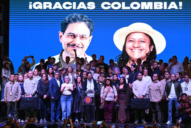 Colombia's presidential candidate for the ruling Pacto Historico party, Ivan Cepeda (C), speaks after the first results of the presidential election runoff at the Tequendama Hotel in Bogota on June 21, 2026. A flamboyant US-backed lawyer who has never held public office narrowly won Colombia's presidential runoff on June 21, swinging the country hard to the right on a promise to wage war against drug-running guerrilla groups. With more than 99 percent of polling centers reporting, Abelardo de la Espriella had 49.67 percent of the vote, an unassailable lead over his rival, left-wing Senator Ivan Cepeda who trailed at 48.69 percent, according to official results. (Photo by Raul ARBOLEDA / AFP)