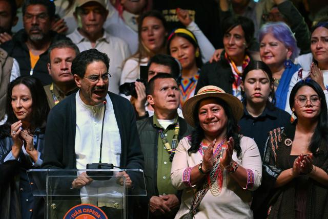 Colombia's presidential candidate for the ruling Pacto Historico party, Ivan Cepeda, speaks next to running mate Aida Quilcue (2nd R) after the first results of the presidential election runoff at the Tequendama Hotel in Bogota on June 21, 2026. A flamboyant US-backed lawyer who has never held public office narrowly won Colombia's presidential runoff on June 21, swinging the country hard to the right on a promise to wage war against drug-running guerrilla groups. With more than 99 percent of polling centers reporting, Abelardo de la Espriella had 49.67 percent of the vote, an unassailable lead over his rival, left-wing Senator Ivan Cepeda who trailed at 48.69 percent, according to official results. (Photo by Raul ARBOLEDA / AFP)