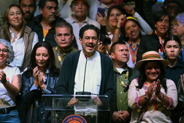 Colombia's presidential candidate for the ruling Pacto Historico party, Ivan Cepeda, speaks next to running mate Aida Quilcue (R) after the first results of the presidential election runoff at the Tequendama Hotel in Bogota on June 21, 2026. A flamboyant US-backed lawyer who has never held public office narrowly won Colombia's presidential runoff on June 21, swinging the country hard to the right on a promise to wage war against drug-running guerrilla groups. With more than 99 percent of polling centers reporting, Abelardo de la Espriella had 49.67 percent of the vote, an unassailable lead over his rival, left-wing Senator Ivan Cepeda who trailed at 48.69 percent, according to official results. (Photo by Raul ARBOLEDA / AFP)