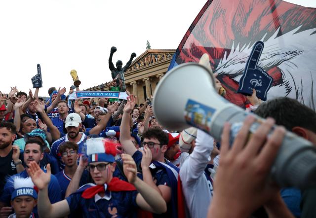 France fans gather at the Rocky statue in front of the Philadelphia Museum of Art on the eve of the 2026 World Cup Group C football match between France and Irak in Philadelphia on June 21, 2026. (Photo by FRANCK FIFE / AFP)
