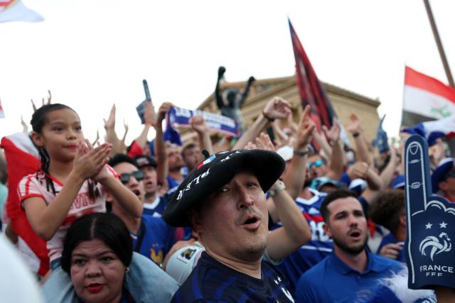 France fans gather at the Rocky statue in front of the Philadelphia Museum of Art on the eve of the 2026 World Cup Group C football match between France and Irak in Philadelphia on June 21, 2026. (Photo by FRANCK FIFE / AFP)