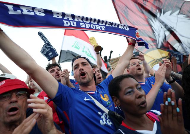 France fans gather at the Rocky statue in front of the Philadelphia Museum of Art on the eve of the 2026 World Cup Group C football match between France and Irak in Philadelphia on June 21, 2026. (Photo by FRANCK FIFE / AFP)