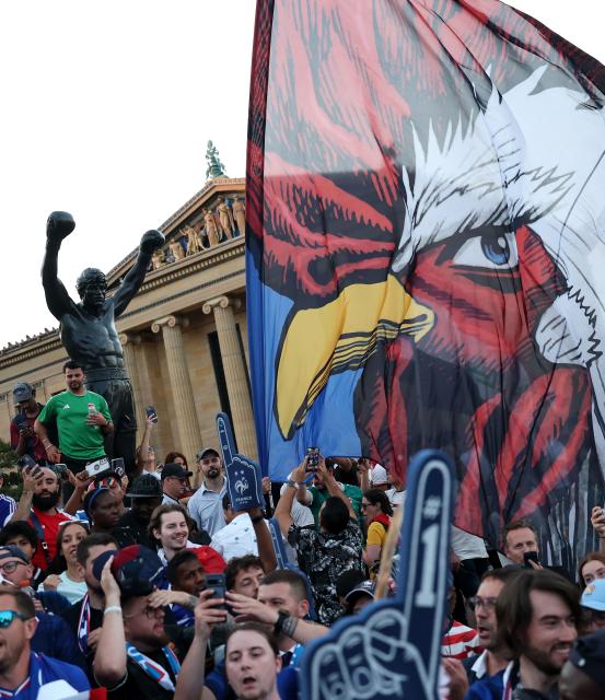 France fans gather at the Rocky statue in front of the Philadelphia Museum of Art on the eve of the 2026 World Cup Group C football match between France and Irak in Philadelphia on June 21, 2026. (Photo by FRANCK FIFE / AFP)