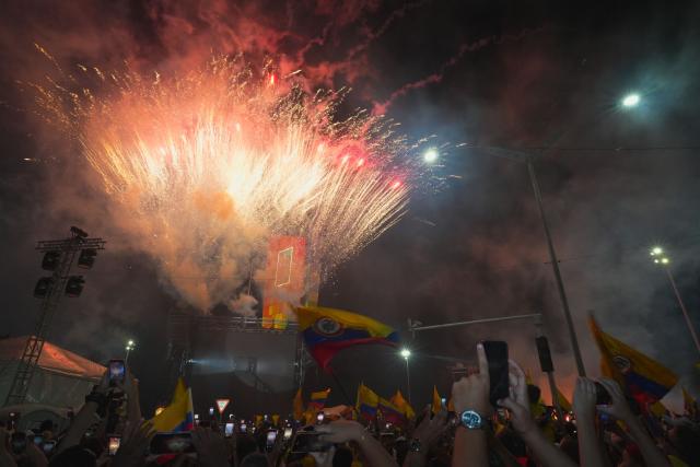 Supporters of Colombia's presidential candidate for the Defensores de la Patria movement Abelardo de la Espriella celebrate the results of the presidential runoff election at the Ventana al Mundo monument in Barranquilla, Colombia, on June 21, 2026. A flamboyant US-backed lawyer who has never held public office narrowly won Colombia's presidential runoff on June 21, swinging the country hard to the right on a promise to wage war against drug-running guerrilla groups. With more than 99 percent of polling centers reporting, Abelardo de la Espriella had 49.67 percent of the vote, an unassailable lead over his rival, left-wing Senator Ivan Cepeda who trailed at 48.69 percent, according to official results. (Photo by Vanexa Romero / AFP)