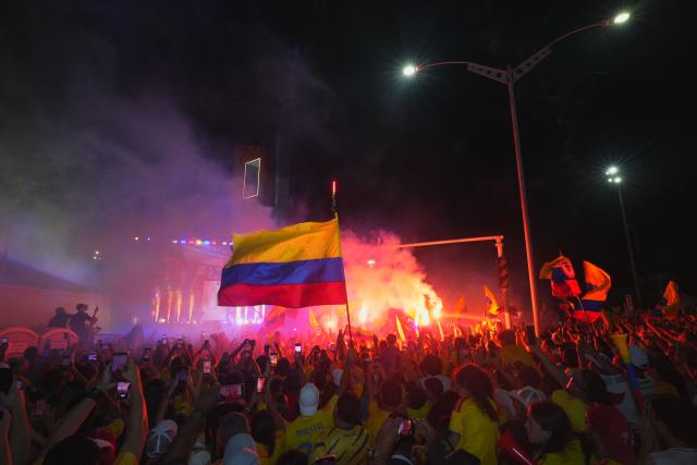 Supporters of Colombia's presidential candidate for the Defensores de la Patria movement Abelardo de la Espriella celebrate the results of the presidential runoff election at the Ventana al Mundo monument in Barranquilla, Colombia, on June 21, 2026. A flamboyant US-backed lawyer who has never held public office narrowly won Colombia's presidential runoff on June 21, swinging the country hard to the right on a promise to wage war against drug-running guerrilla groups. With more than 99 percent of polling centers reporting, Abelardo de la Espriella had 49.67 percent of the vote, an unassailable lead over his rival, left-wing Senator Ivan Cepeda who trailed at 48.69 percent, according to official results. (Photo by Vanexa Romero / AFP)