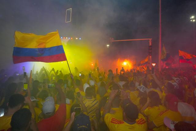 Supporters of Colombia's presidential candidate for the Defensores de la Patria movement Abelardo de la Espriella celebrate the results of the presidential runoff election at the Ventana al Mundo monument in Barranquilla, Colombia, on June 21, 2026. A flamboyant US-backed lawyer who has never held public office narrowly won Colombia's presidential runoff on June 21, swinging the country hard to the right on a promise to wage war against drug-running guerrilla groups. With more than 99 percent of polling centers reporting, Abelardo de la Espriella had 49.67 percent of the vote, an unassailable lead over his rival, left-wing Senator Ivan Cepeda who trailed at 48.69 percent, according to official results. (Photo by Vanexa Romero / AFP)