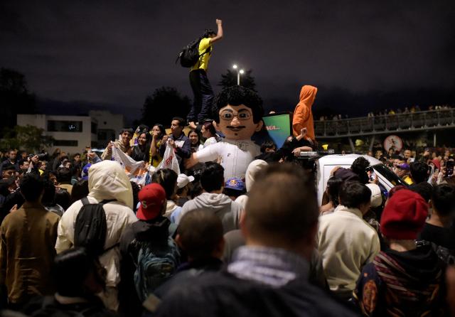 Supporters of Colombia's presidential candidate Ivan Cepeda of the ruling Pacto Historico party gather following the preliminary results of the presidential runoff election in Bogota on June 21, 2026. A flamboyant US-backed lawyer who has never held public office narrowly won Colombia's presidential runoff on June 21, swinging the country hard to the right on a promise to wage war against drug-running guerrilla groups. With more than 99 percent of polling centers reporting, Abelardo de la Espriella had 49.67 percent of the vote, an unassailable lead over his rival, left-wing Senator Ivan Cepeda who trailed at 48.69 percent, according to official results. (Photo by Sebastian BARROS / AFP)