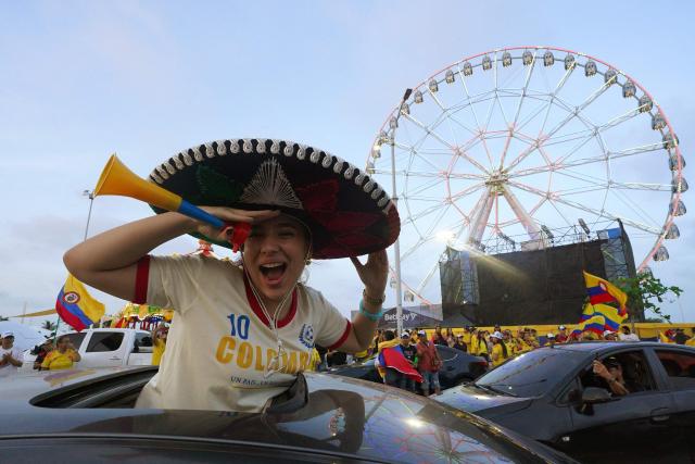 Supporters of Colombia's presidential candidate for the Defensores de la Patria movement, Abelardo de la Espriella, celebrate following the preliminary results of the presidential runoff election at the Ventana al Mundo monument in Barranquilla, Colombia, on June 21, 2026. A flamboyant US-backed lawyer who has never held public office narrowly won Colombia's presidential runoff on June 21, swinging the country hard to the right on a promise to wage war against drug-running guerrilla groups. With just a handful of polling centers left to report, Abelardo de la Espriella had 49.65 percent of the vote -- an unassailable lead over left-wing Senator Ivan Cepeda who trailed on 48.70 percent. (Photo by Vanexa Romero / AFP)