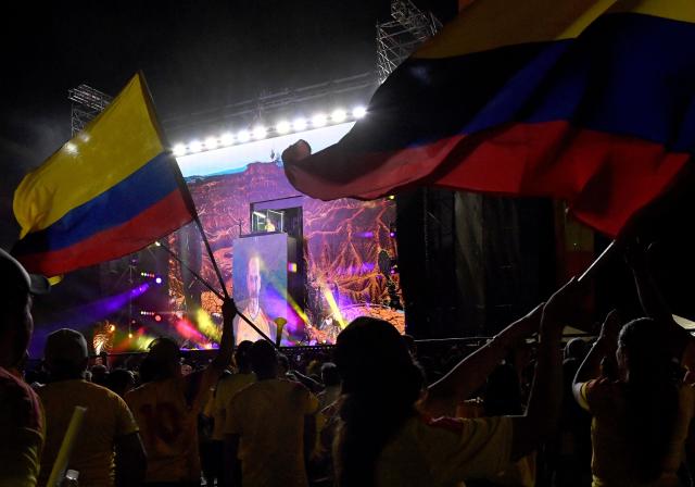 Supporters of Colombia's presidential candidate for the Defensores de la Patria movement, Abelardo de la Espriella, celebrate following the preliminary results of the presidential runoff election at the Ventana al Mundo monument in Barranquilla, Colombia, on June 21, 2026. A flamboyant US-backed lawyer who has never held public office narrowly won Colombia's presidential runoff on June 21, swinging the country hard to the right on a promise to wage war against drug-running guerrilla groups. With just a handful of polling centers left to report, Abelardo de la Espriella had 49.65 percent of the vote -- an unassailable lead over left-wing Senator Ivan Cepeda who trailed on 48.70 percent. (Photo by Jaime SALDARRIAGA / AFP)