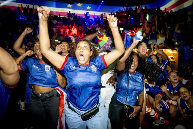 Cape Verde supporters react as they watch the screening of the 2026 World Cup Group H football match between Uruguay and Cape Verde, in Rotterdam, in June 21, 2026. (Photo by Robin Utrecht / ANP / AFP) / Netherlands OUT