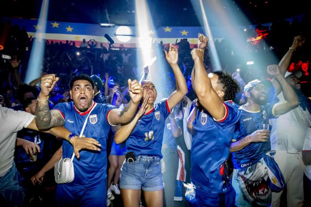 Cape Verde supporters react as they watch the screening of the 2026 World Cup Group H football match between Uruguay and Cape Verde, in Rotterdam, in June 21, 2026. (Photo by Robin Utrecht / ANP / AFP) / Netherlands OUT