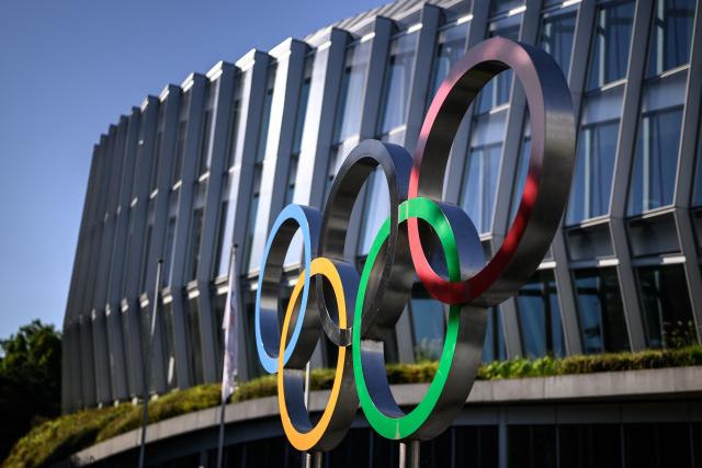 This photograph shows the Olympic rings prior to an IOC executive commission meeting ahead of IOC session, at the Olympic House in Lausanne, on June 22, 2026. (Photo by Fabrice COFFRINI / AFP)