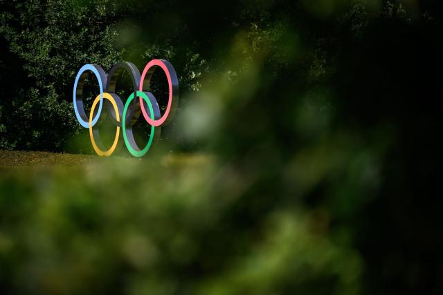 This photograph shows the Olympic rings prior to an IOC executive commission meeting ahead of IOC session, at the Olympic House in Lausanne, on June 22, 2026. (Photo by Fabrice COFFRINI / AFP)