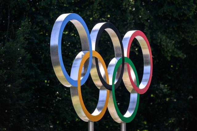 This photograph shows the Olympic rings prior to an IOC executive commission meeting ahead of IOC session, at the Olympic House in Lausanne, on June 22, 2026. (Photo by Fabrice COFFRINI / AFP)