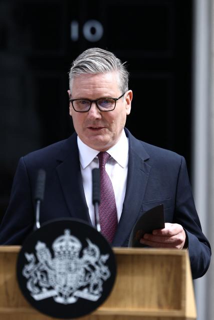 Britain's Prime Minister Keir Starmer begins to make a statement on his future outside 10 Downing Street on the morning of June 22, 2026, in London. British Prime Minister Keir Starmer announced his resignation on Monday after fewer than two years in office in a term characterised by policy U-turns and deep public unpopularity. (Photo by Henry NICHOLLS / AFP)