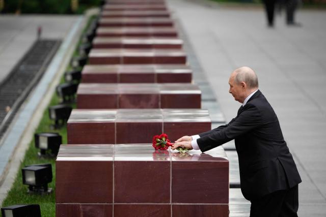 Russian President Vladimir Putin attends a wreath-laying ceremony marking the 85th anniversary of the Nazi Germany invasion into the Soviet Union in World War II on the Remembrance and Sorrow Day at the Tomb of the Unknown Soldier by the Kremlin wall in Moscow on June 22, 2026. (Photo by Pavel Bednyakov / POOL / AFP)