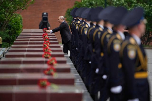 Russian President Vladimir Putin attends a wreath-laying ceremony marking the 85th anniversary of the Nazi Germany invasion into the Soviet Union in World War II on the Remembrance and Sorrow Day at the Tomb of the Unknown Soldier by the Kremlin wall in Moscow on June 22, 2026. (Photo by Pavel Bednyakov / POOL / AFP)