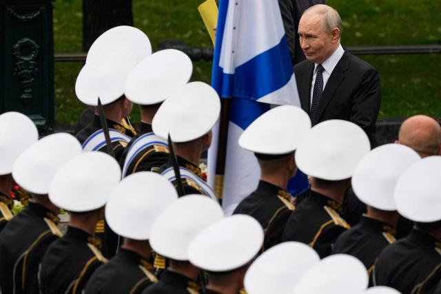 Russian President Vladimir Putin attends a wreath-laying ceremony marking the 85th anniversary of the Nazi Germany invasion into the Soviet Union in World War II on the Remembrance and Sorrow Day at the Tomb of the Unknown Soldier by the Kremlin wall in Moscow on June 22, 2026. (Photo by Alexander Zemlianichenko / POOL / AFP)