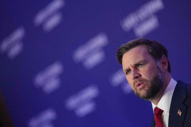 US Vice President JD Vance speaks to members of the media before boarding Air Force Two, after the US and Iran held high-level talks at the Lake Lucerne Summit, at Emmen Military Air Base, in Emmen, Switzerland, June 22, 2026. (Photo by Nathan Howard / POOL / AFP)