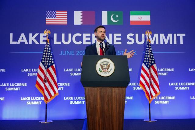 US Vice President JD Vance speaks to members of the media before boarding Air Force Two, after the US and Iran held high-level talks at the Lake Lucerne Summit, at Emmen Military Air Base, in Emmen, Switzerland, June 22, 2026. (Photo by Nathan Howard / POOL / AFP)