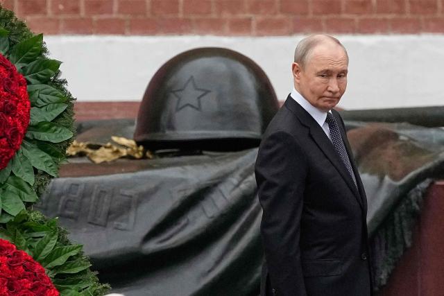 Russian President Vladimir Putin attends a wreath-laying ceremony marking the 85th anniversary of the Nazi Germany invasion into the Soviet Union in World War II on the Remembrance and Sorrow Day at the Tomb of the Unknown Soldier by the Kremlin wall in Moscow on June 22, 2026. (Photo by Alexander Zemlianichenko / POOL / AFP)