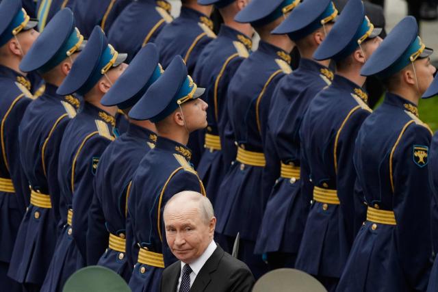 Russian President Vladimir Putin attends a wreath-laying ceremony marking the 85th anniversary of the Nazi Germany invasion into the Soviet Union in World War II on the Remembrance and Sorrow Day at the Tomb of the Unknown Soldier by the Kremlin wall in Moscow on June 22, 2026. (Photo by Alexander Zemlianichenko / POOL / AFP)