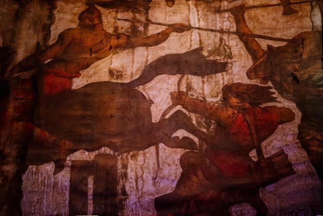 This photograph shows a view of a former mural, which was hidden beneath multiple layers in Paris' Cirque d’Hiver during its renovation, in Paris, on June 22, 2026. (Photo by Dimitar DILKOFF / AFP)