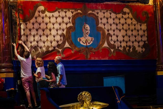 Employees work on the renovation of Paris's Cirque d’Hiver in Paris, on June 22, 2026. (Photo by Dimitar DILKOFF / AFP)