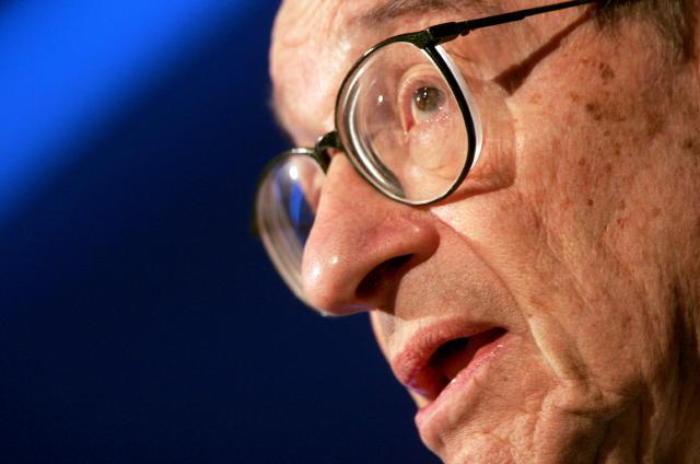 (FILES) US Federal Reserve Board Chairman Alan Greenspan talks at the Advancing Enterprise Conference & G7 Finance Ministers and Central Bank Governers' Meeting in central London December 2 2005. A "pernicious drift" toward unstable budgets and trade protectionism risks a painful unwinding of world financial imbalances and must be checked, Greenspan warned on Friday. Greenspan, the longtime US Federal Reserve chief who presided over an unprecedented American economic expansion but was later faulted for failing to rein in financial markets before the 2008 global crisis, died on June 22, 2026, US media reported. (Photo by TOBY MELVILLE / POOL / AFP)