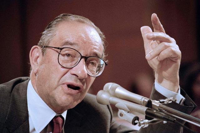 (FILES) US Federal Reserve Chairman Alan Greenspan testifies before the Senate Banking, Housing, and Urban Affairs Committee in Washington on July 18, 1990. Greenspan, the longtime US Federal Reserve chief who presided over an unprecedented American economic expansion but was later faulted for failing to rein in financial markets before the 2008 global crisis, died on June 22, 2026, US media reported. (Photo by Luke FRAZZA / AFP)