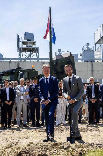 Thales Netherlands' CEO Otto de Bont (L) poses with Dutch State Secretary for Defense Derk van Boswijk during the announcement of a new partnership to expand the production, development and test capacity for advanced radar systems in Hengelo on June 22, 2026. (Photo by Vincent Jannink / ANP / AFP) / Netherlands OUT
